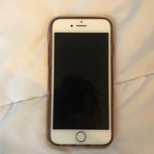 Rose Gold IPhone 7 with case. Had a slight chip on bottom.